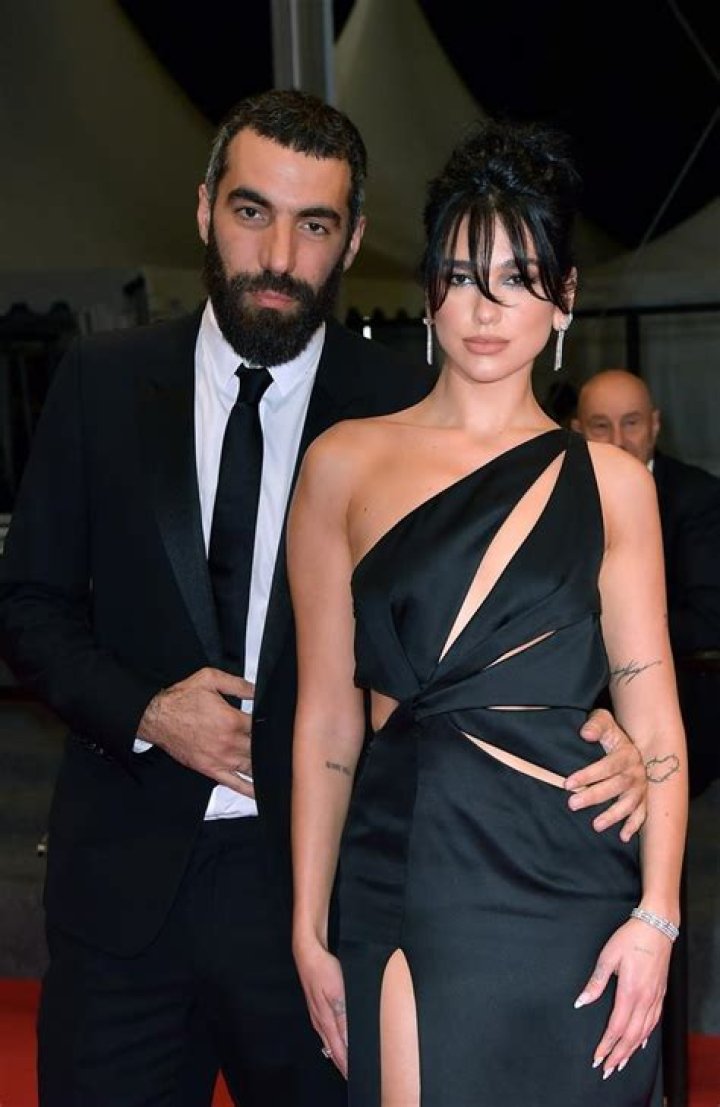 
Dua Lipa Confirms Romain Gavras Dating Rumor By Holding Hands In Paris 